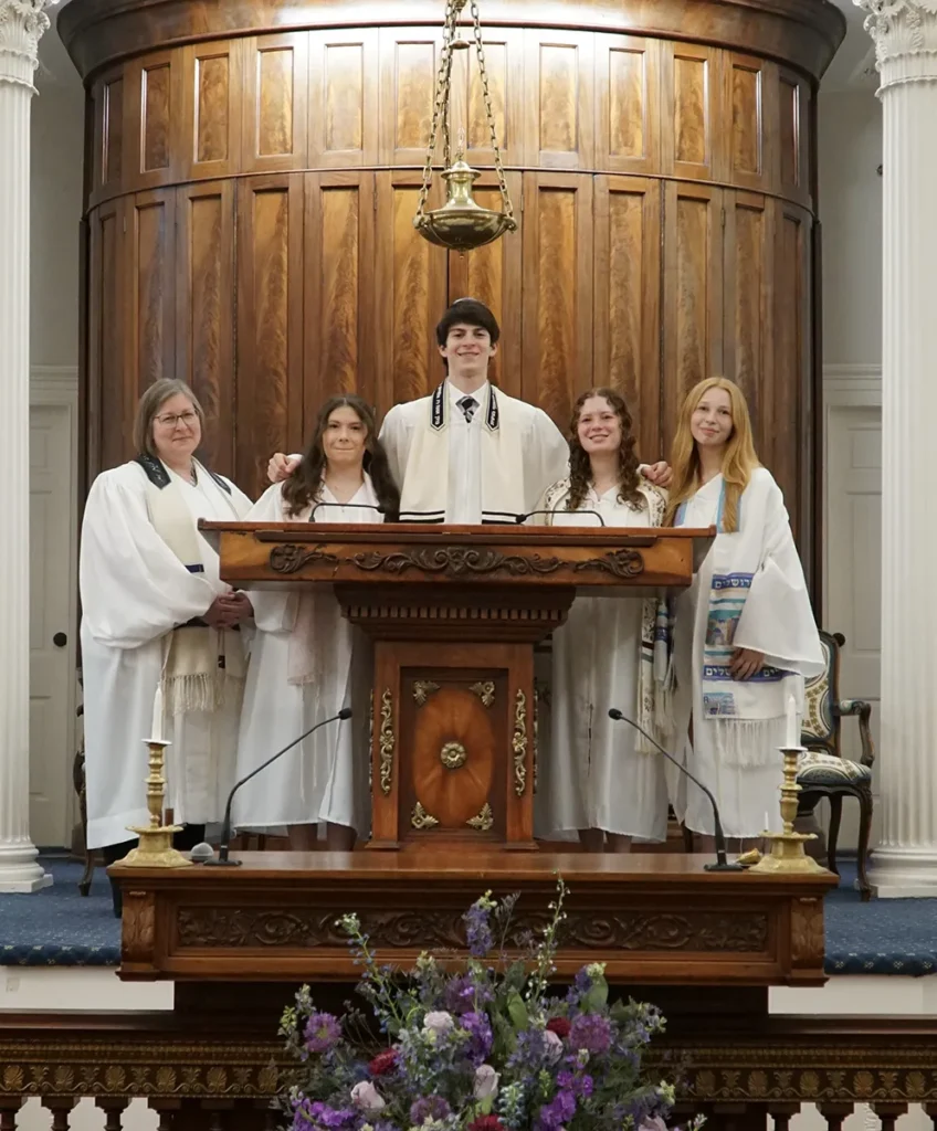 group of kids with a rabbi on their confirmation